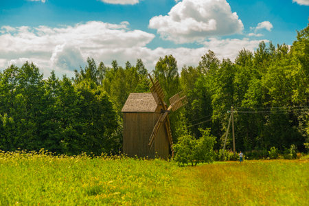 MINSK, BELARUS: An old wooden mill. Belarusian State Museum of Folk Architecture and Life in the village of Ozertso. Open-air museum.のeditorial素材