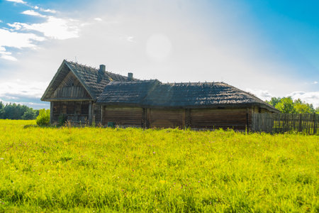 MINSK, OZERTSO, BELARUS: Old wooden village house. Belarusian State Museum of Folk Architecture and Life in the village of Ozertso. Open-air museum.のeditorial素材
