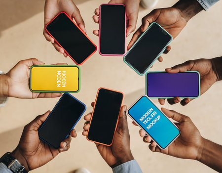 A group of diverse hands holding smartphones, showcasing connection, technology, and communication in a modern world. Perfect for illustrating global networks and digital lifestyles.の素材