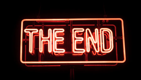 Neon sign with text The End, on a black background.の素材