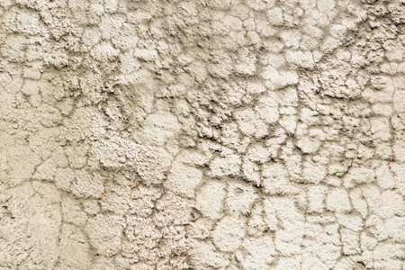 Wall with cracks in the plasterの写真素材