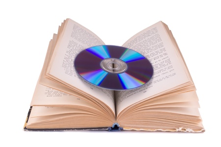 Open book and compact disc isolated on white