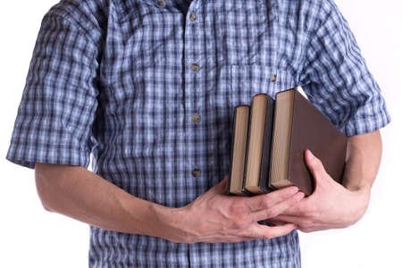 Men's holding a three books isolatedの写真素材