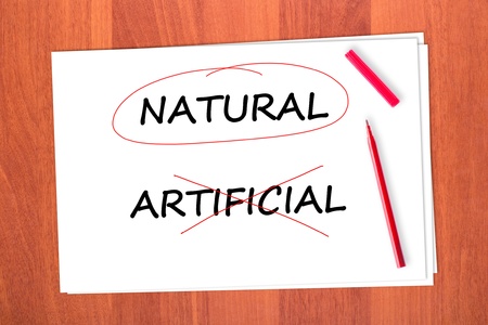 Chose the word NATURAL, crossed out the word ARTIFICIALの写真素材
