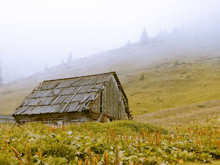 Old abandoned building on the hillsideの写真素材