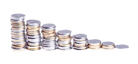 Falling stack of coins, isolated on whiteの写真素材