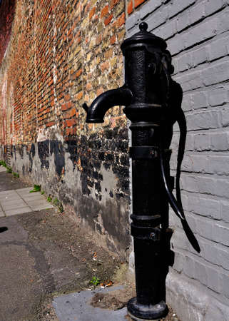 Water pump in Bruggeの写真素材