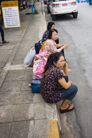 CHIANGRAI, THAILAND - AUG 12: unidentified people waiting for bus at the roadside on August 12, 2014 in Chiangrai, Thailand.のeditorial素材