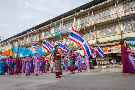 CHIANGRAI, THAILAND - AUG 12: unidentified people celebrating Thai Mother Day on August 12, 2014 in Chiangrai, Thailand. Today is a celebration of the Queen's birthday as well as to honor every mothers.のeditorial素材