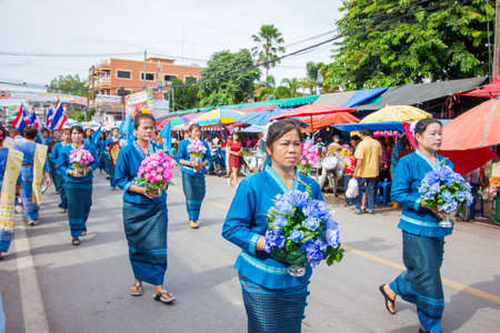 CHIANGRAI, THAILAND - AUG 12: unidentified people celebrating Thai Mother Day on August 12, 2014 in Chiangrai, Thailand. Today is a celebration of the Queen's birthday as well as to honor every mothers.のeditorial素材