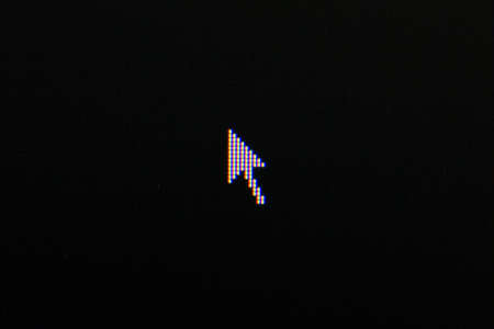 cursor on black background. Macro screen view of old monitorの写真素材