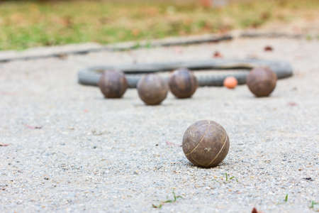 old rusty petanque on petanque courtの写真素材