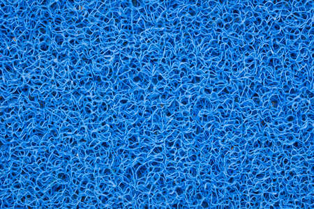 Background of green carpet or foot scraper or door mat texture.の写真素材