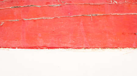 red old wooden wall and white concrete below.の写真素材