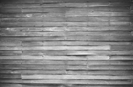 close up of wall made of wooden planks, vignette, black and whiteの写真素材