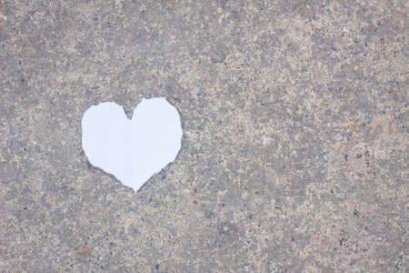 heart paper on the ground with copyspaceの写真素材