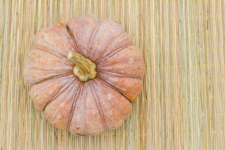 Still Life pumpkin on traditional mat with copyspace on the rightの写真素材