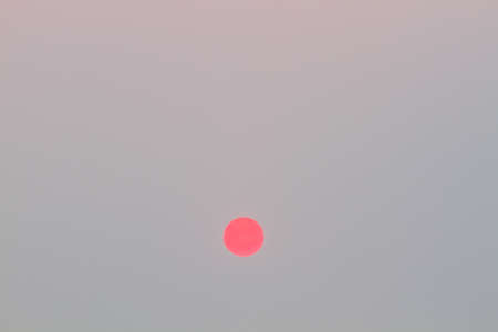 sun and blank pastel cloudless sky, vintage style.の写真素材