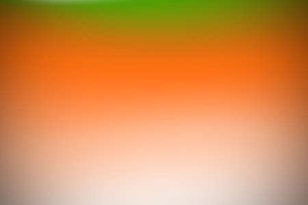 abstract warm orange yellow green background motion blurの写真素材