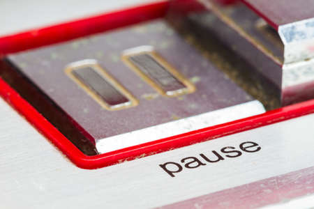 soft focus pause botton, focusing on the word pause, retro conceptの写真素材