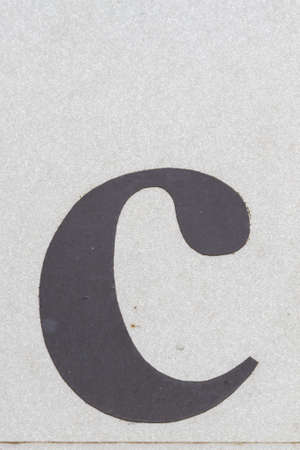 Closeup black letter c from traffic road sign in thailandの写真素材