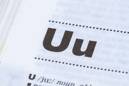 closeup letter U in dictionary, soft focus,の写真素材