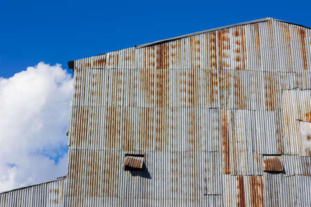 closeup old mill made of rusty galvanized ironの写真素材