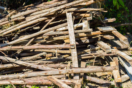 Waste wood pile abandon on the groundの写真素材