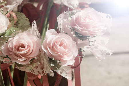 closeup bouquet of colorful artificial roses, success concept, vintage retro filtered.の写真素材