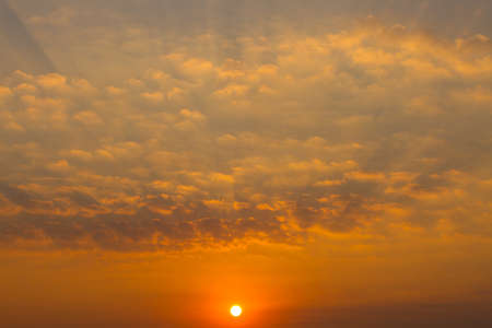sky with beautiful clouds and rising sun, horizontalの写真素材