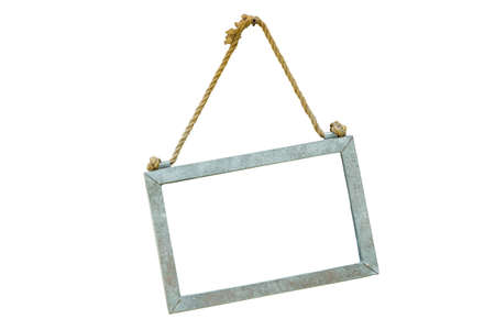 blackboard with rope hanging in the wall blank space in the middle, isolated on white background, clipping pathの写真素材