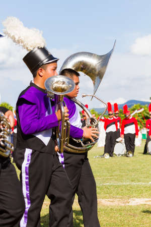 CHIANG RAI, THAILAND - SEPTEMBER 19 : unidentified students playing brass instruments in parade for sporting day on September 19, 2016 in Chiang rai, Thailand.のeditorial素材