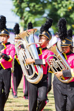 CHIANG RAI, THAILAND - SEPTEMBER 19 : unidentified students playing brass instruments in parade for...