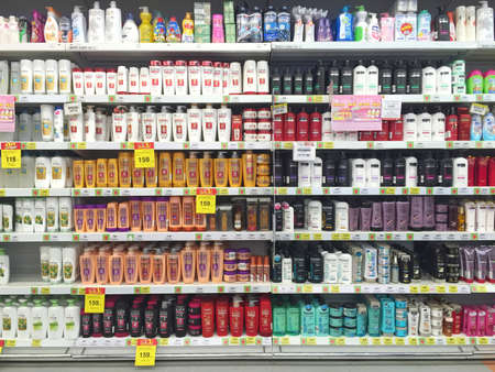CHIANG RAI, THAILAND - OCTOBER 28 : various brand of shampoo bottles for sale on supermarket stand or shelf in Big C Supercenter on October 28, 2016 in Chiang rai, Thailand.のeditorial素材