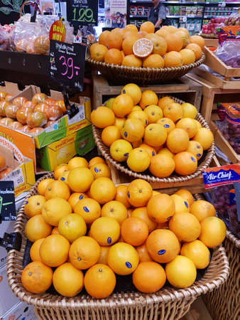 BANGKOK, THAILAND - NOVEMBER 30 : fresh organic vegetables and fruits for sale on stand or basket in Tops Supermarket on November 30, 2016 in BANGKOK, Thailand.のeditorial素材