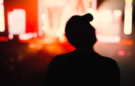 silhouette defocused blurred man in rock concertの写真素材