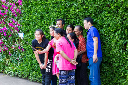 CHIANGRAI, THAILAND - DECEMBER 7: unidentified asian tourists taking photo in flower festival on December 7, 2016 in Chiangrai, Thailand.のeditorial素材