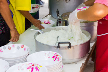 CHIANG RAI, THAILAND - FEBRUARY 19 : unidentified asian people eating food under a tent on February 19, 2016 in Chiang rai, Thailand.のeditorial素材
