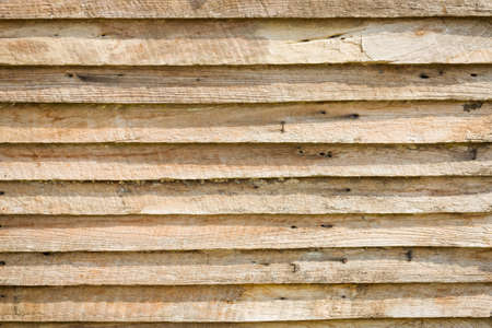 grungy brown wood plank wall texture background, with shadowの写真素材
