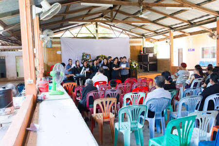 CHIANG RAI, THAILAND - APRIL 19 : unidentified asian people singing in thai traditional Christian funeral on April 19, 2017 in Chiang rai, Thailand.のeditorial素材