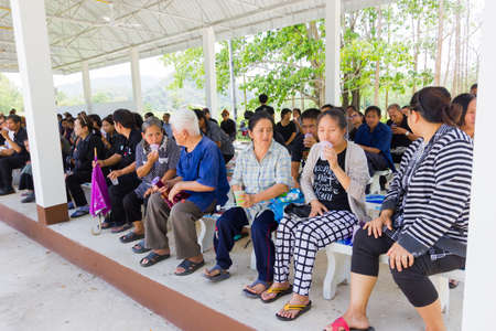 CHIANG RAI, THAILAND - APRIL 19 : unidentified asian people participating thai traditional Christian funeral at the graveyard on April 19, 2017 in Chiang rai, Thailand.のeditorial素材