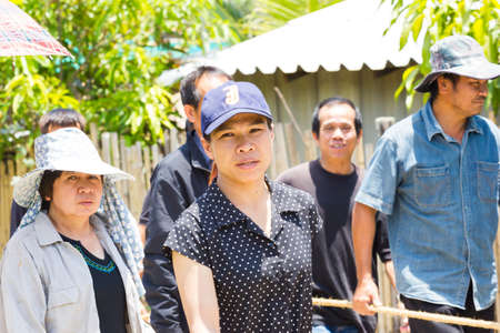 CHIANG RAI, THAILAND - APRIL 19 : unidentified asian Protestant Christian people walking to the graveyard on April 19, 2017 in Chiang rai, Thailand.のeditorial素材