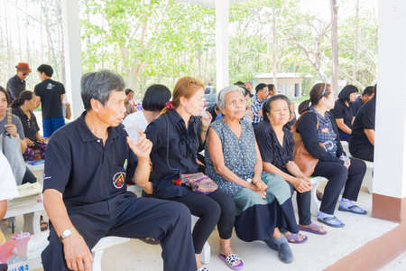 CHIANG RAI, THAILAND - APRIL 19 : unidentified asian people participating thai traditional Christian funeral at the graveyard on April 19, 2017 in Chiang rai, Thailand.のeditorial素材