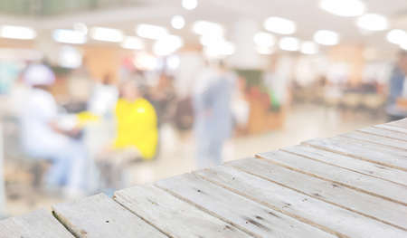 Diagonal wooden floor for displaying products on the background of blur hospital interior