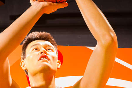 BANGKOK, THAILAND - DECEMBER 19: A waxwork of Yao Ming on display at Madame Tussauds on December 19, 2015 in Bangkok, Thailand.のeditorial素材