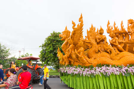 UBON RATCHATHANI, THAILAND - July 8 : unidentified people visit large candle carving in the festival on July 8, 2017 in Ubon Ratchathani, Thailand. low speed shutter shot.のeditorial素材