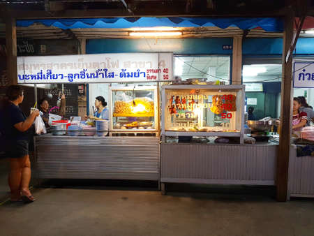 CHIANG MAI, THAILAND - SEPTEMBER 29 : Unidentified asian people selling noodles at street market in the evening on September 29, 2017 in Chiang Mai, Thailand.のeditorial素材