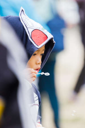 CHIANG RAI, THAILAND - JANUARY 13 : close-up unidentified asian boy blowing bubble with his family on January 13, 2018 in Chiang rai, Thailand.のeditorial素材
