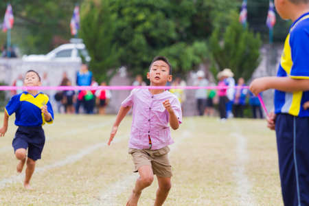 CHIANGRAI, THAILAND - DECEMBER 29: unidentified one asian boy in a running race finish line on December 29, 2017 in Chiangrai, Thailand.のeditorial素材
