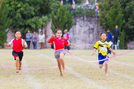 CHIANGRAI, THAILAND - DECEMBER 29: unidentified three asian girls in a running race on December 29, 2017 in Chiangrai, Thailand.のeditorial素材